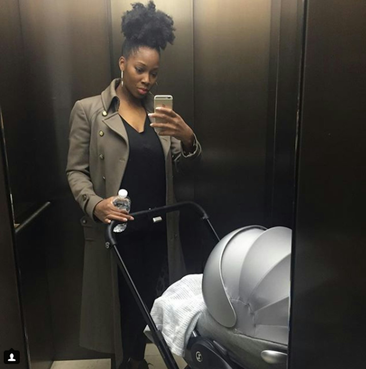 Jamelia with pushchair in lift