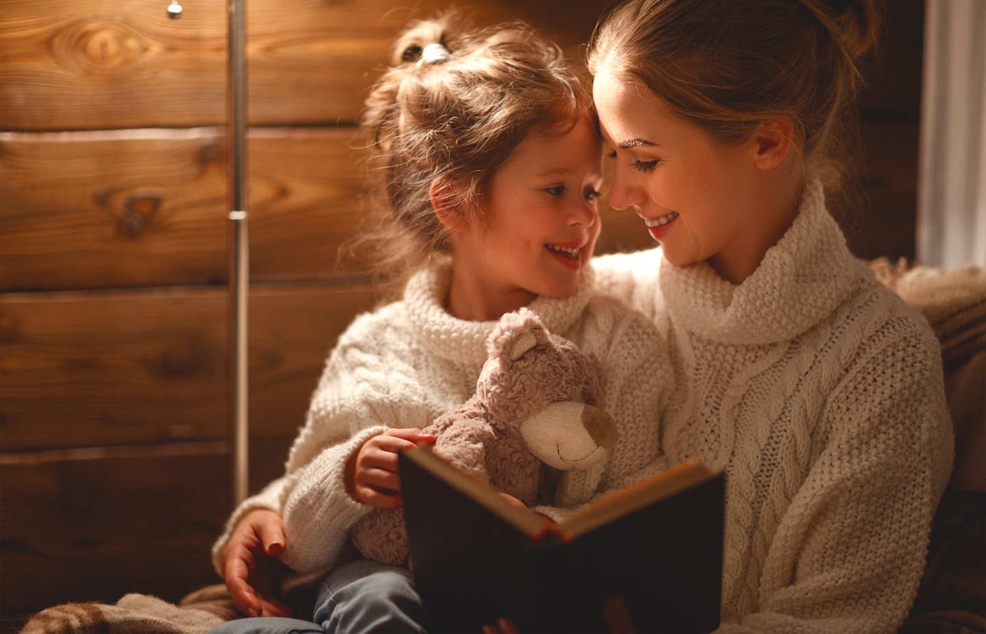 mum reading to toddler