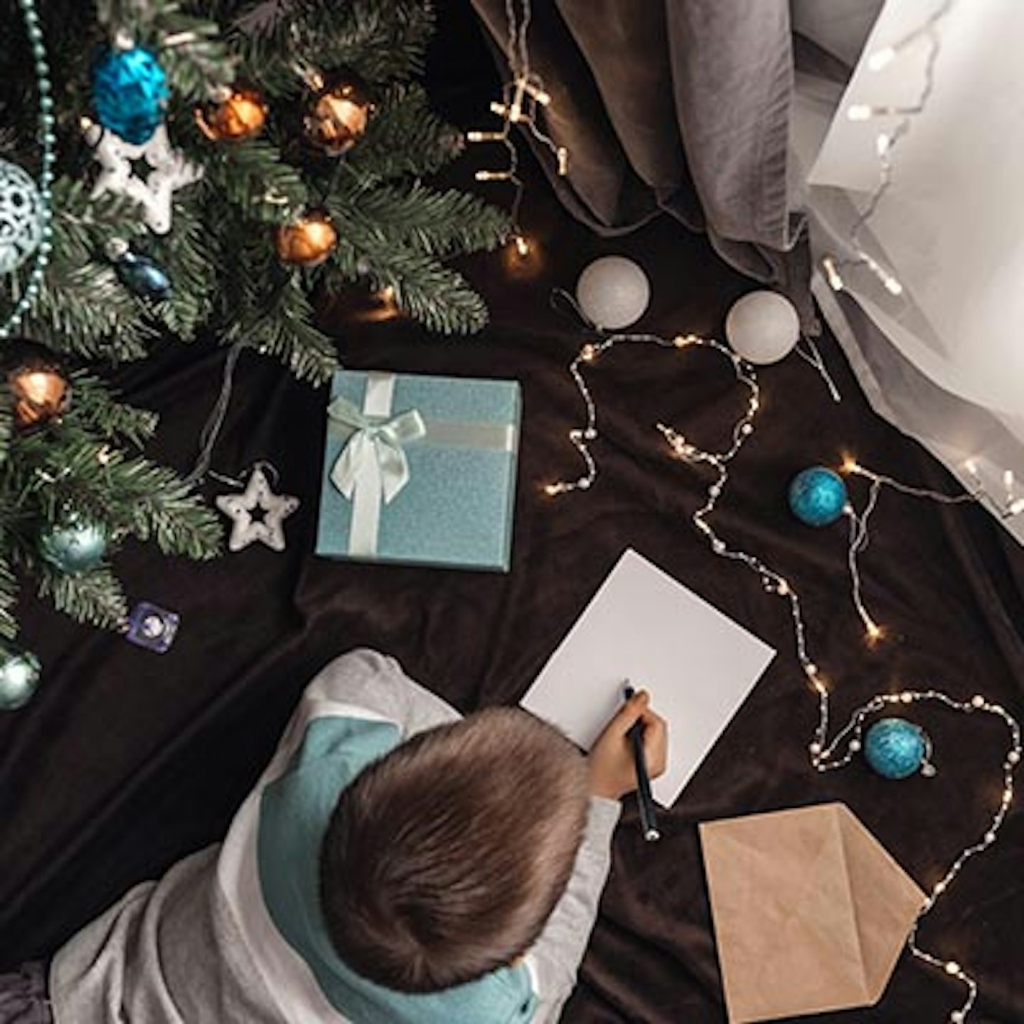 Child writing a festive letter