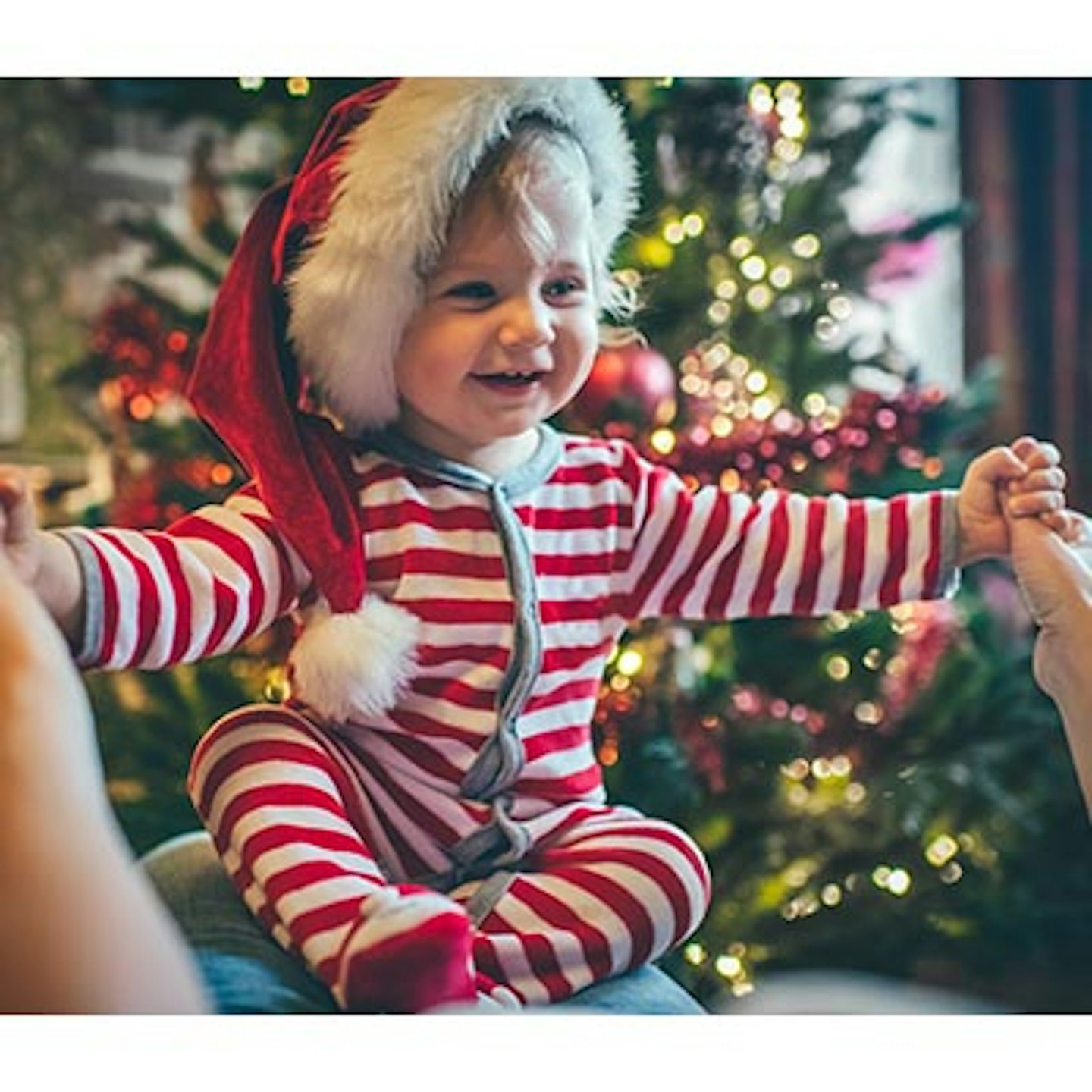 toddler in santa hat