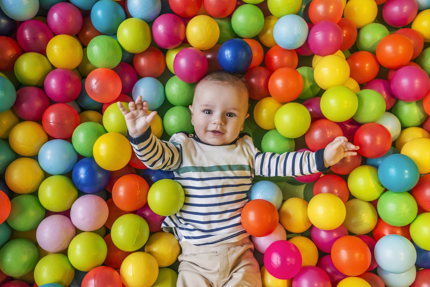 baby in ball pit
