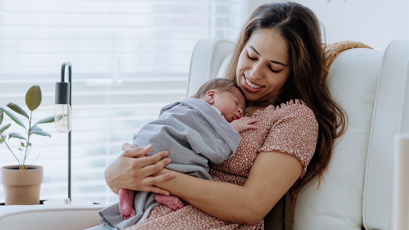 https://images.bauerhosting.com/affiliates/sites/12/motherandbaby/2022/02/woman-and-baby-in-nursing-chair.jpg?ar=16%3A9&fit=crop&crop=top&auto=format&w=undefined&q=80