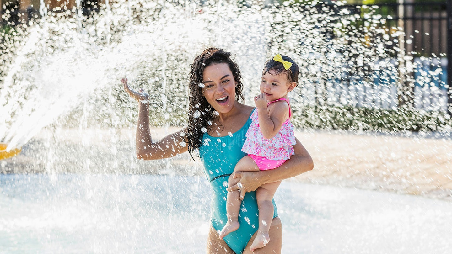Mother and daughter water park