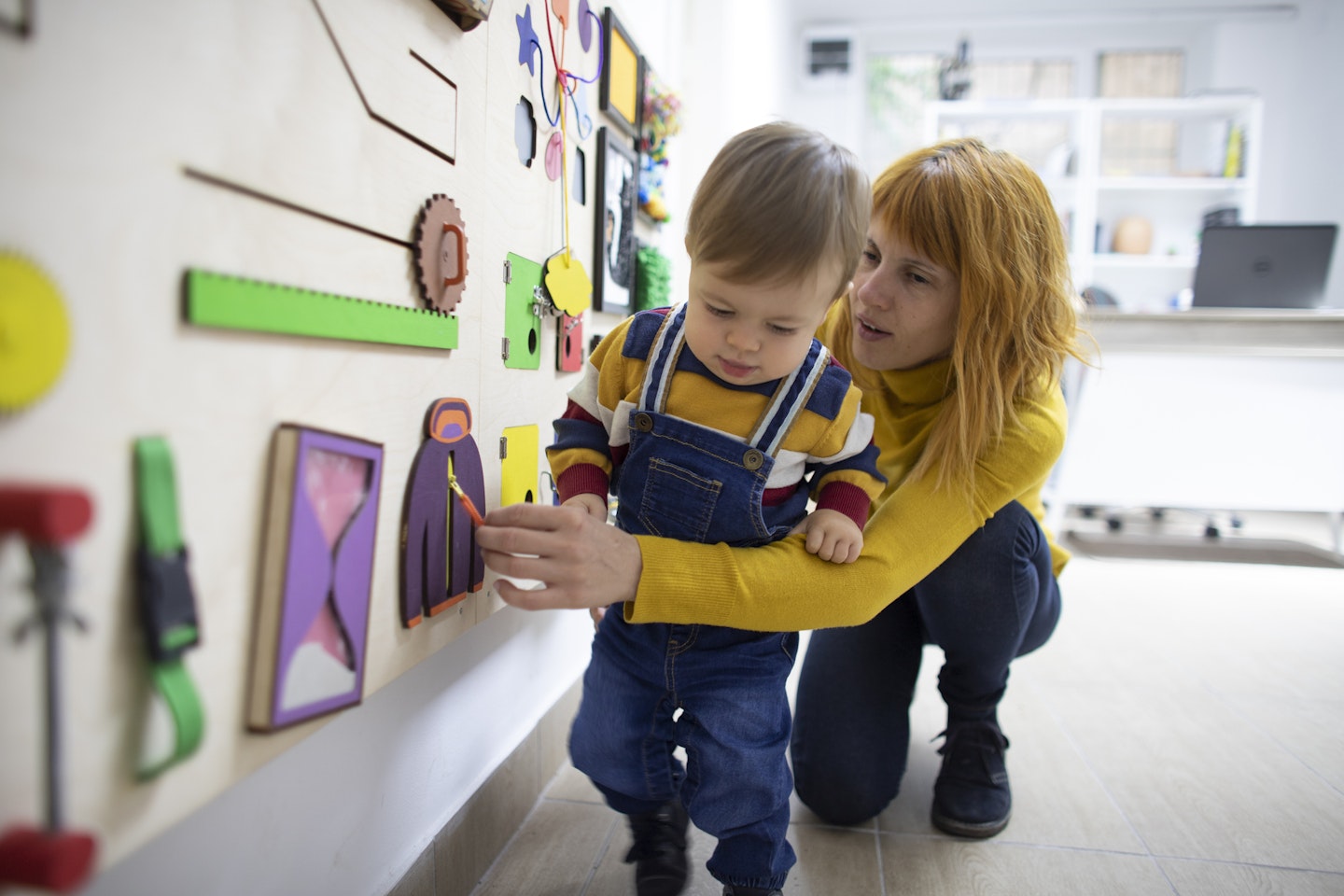 mum helping baby with autism