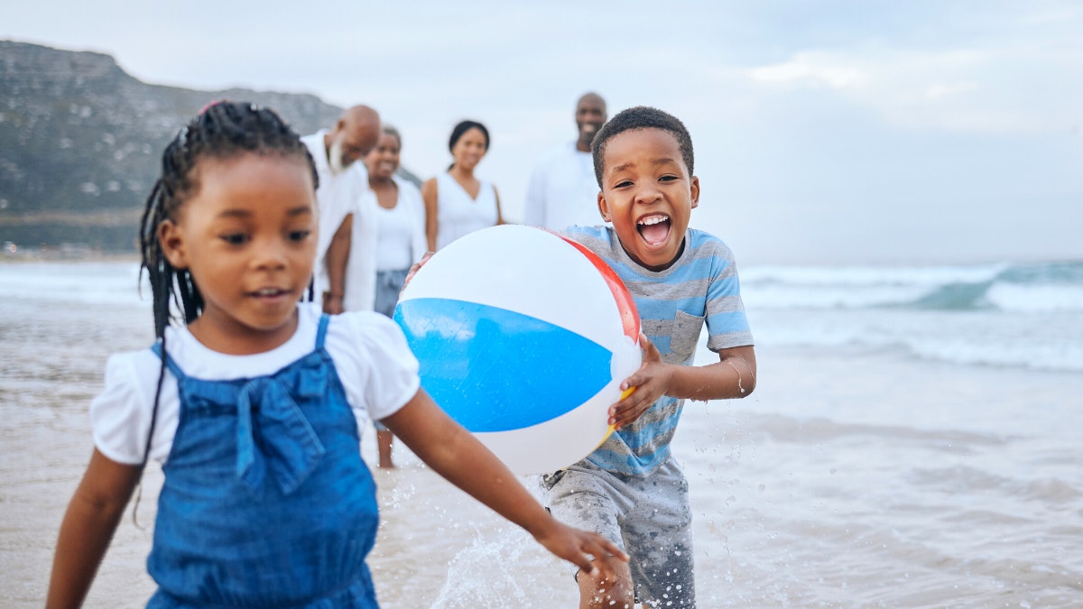 Playing with top beach ball