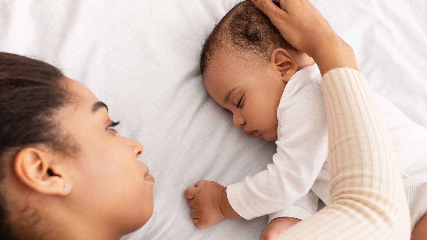 Helping baby sleep outlet with a cold