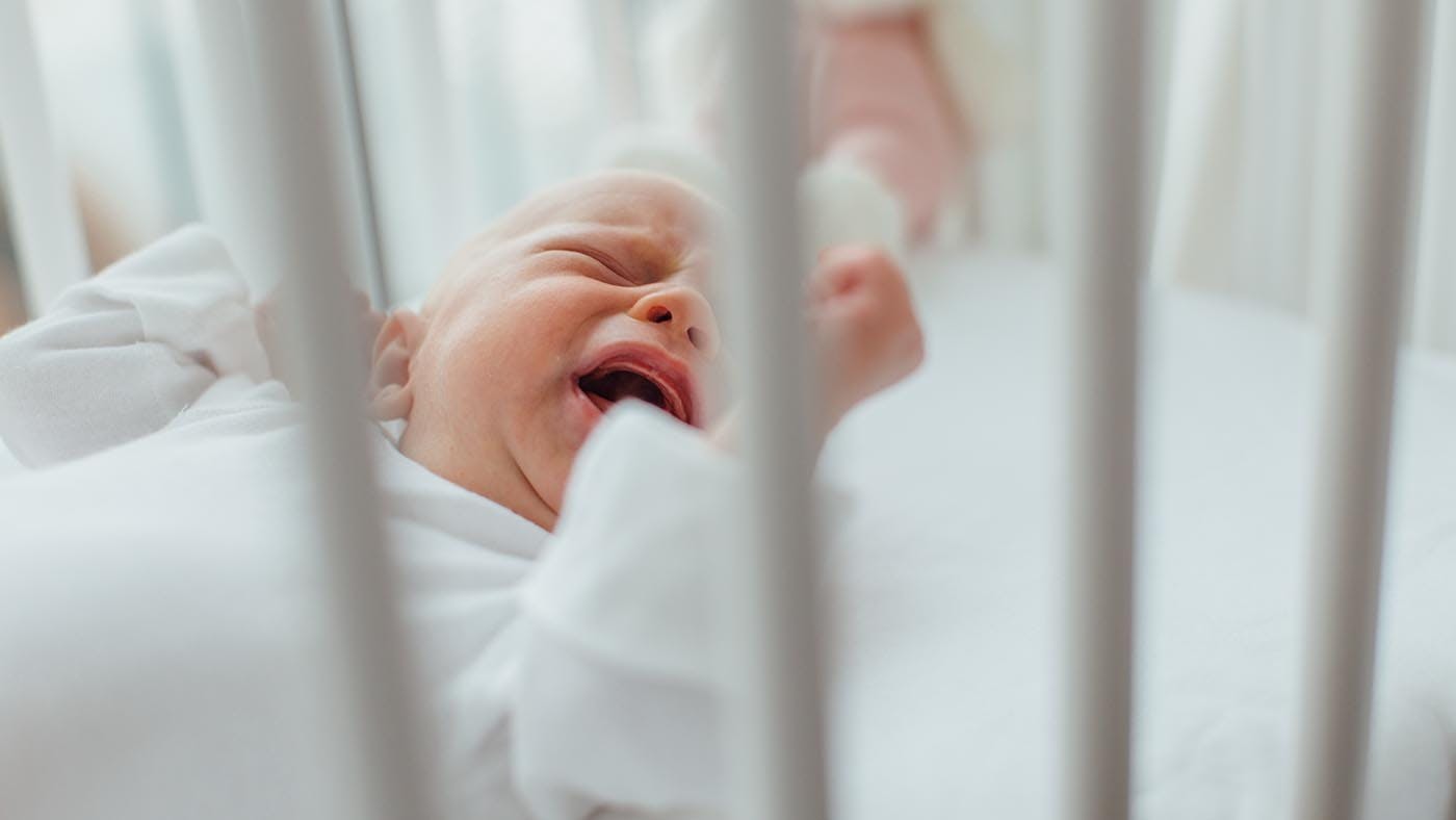 Baby will not sleep in outlet cot