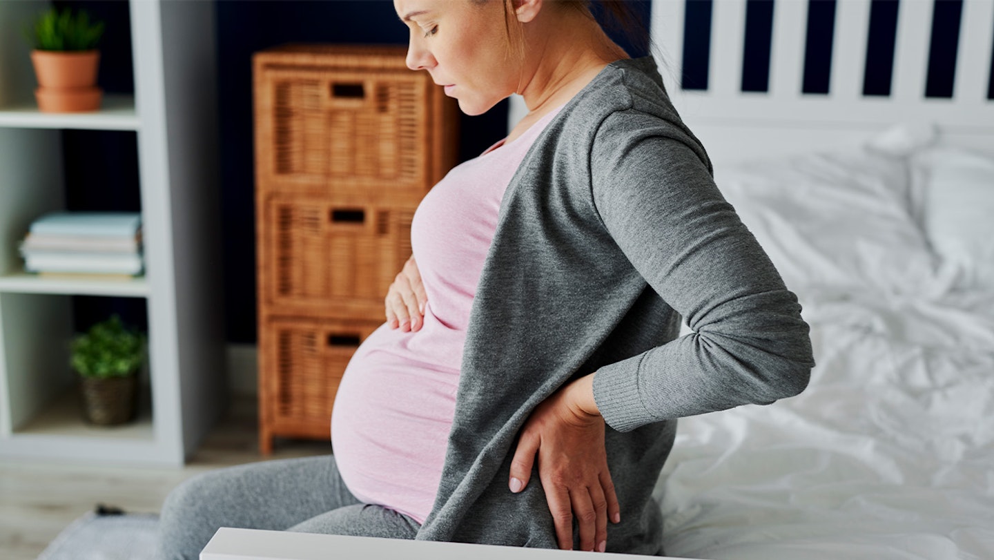 pregnant woman uncomfortable