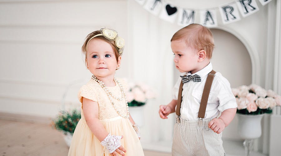 Baby in shop wedding dress