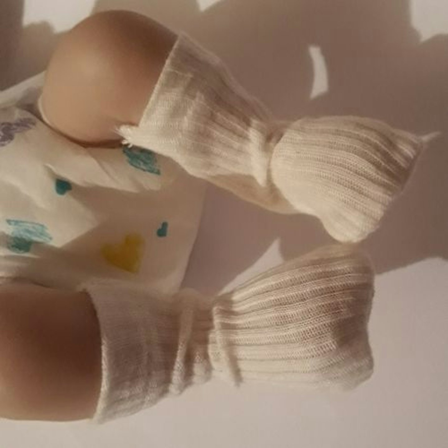 unisex socks in cream by snuggies 1-2lb