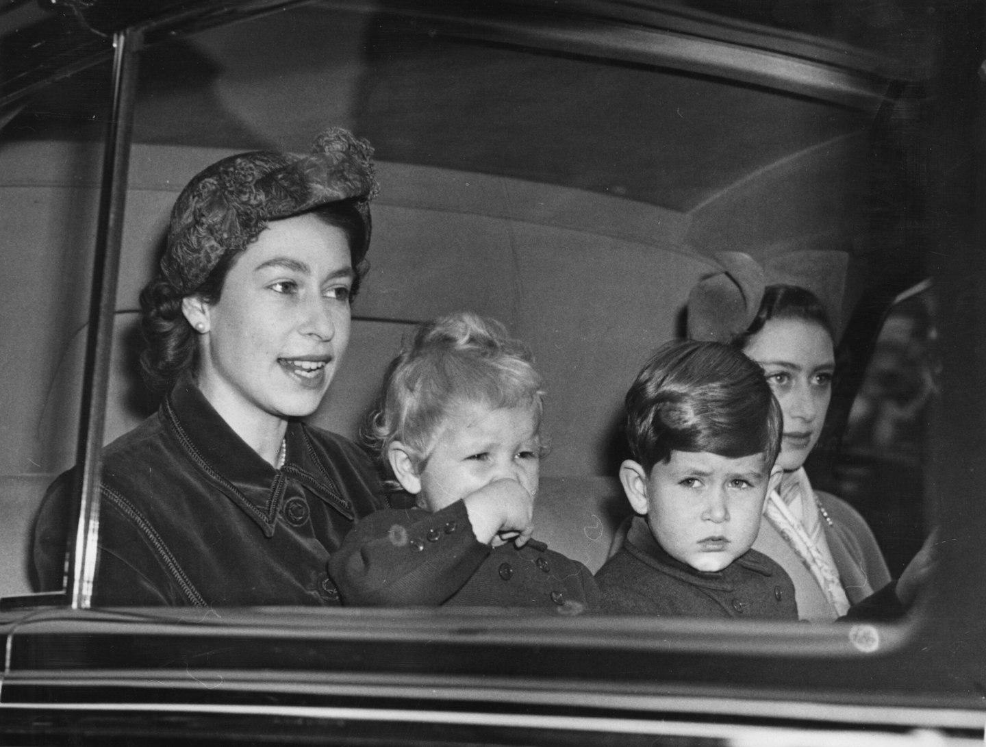 Queen Elizabeth II with her children, Prince Charles and Princess Anne 