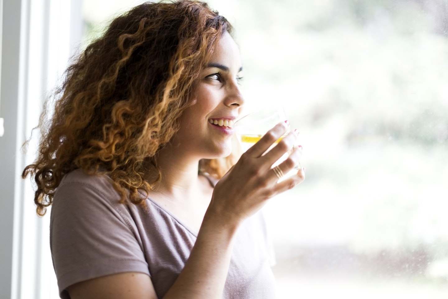 woman drinking glass of water