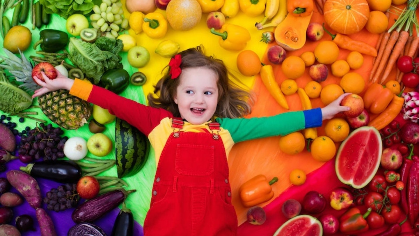 Toddler with nutritious food