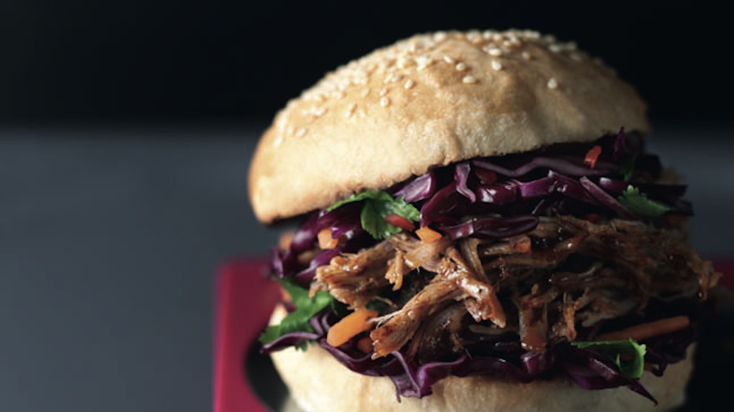 The juices from this slow cooked pork will soak deliciously into the bap.
