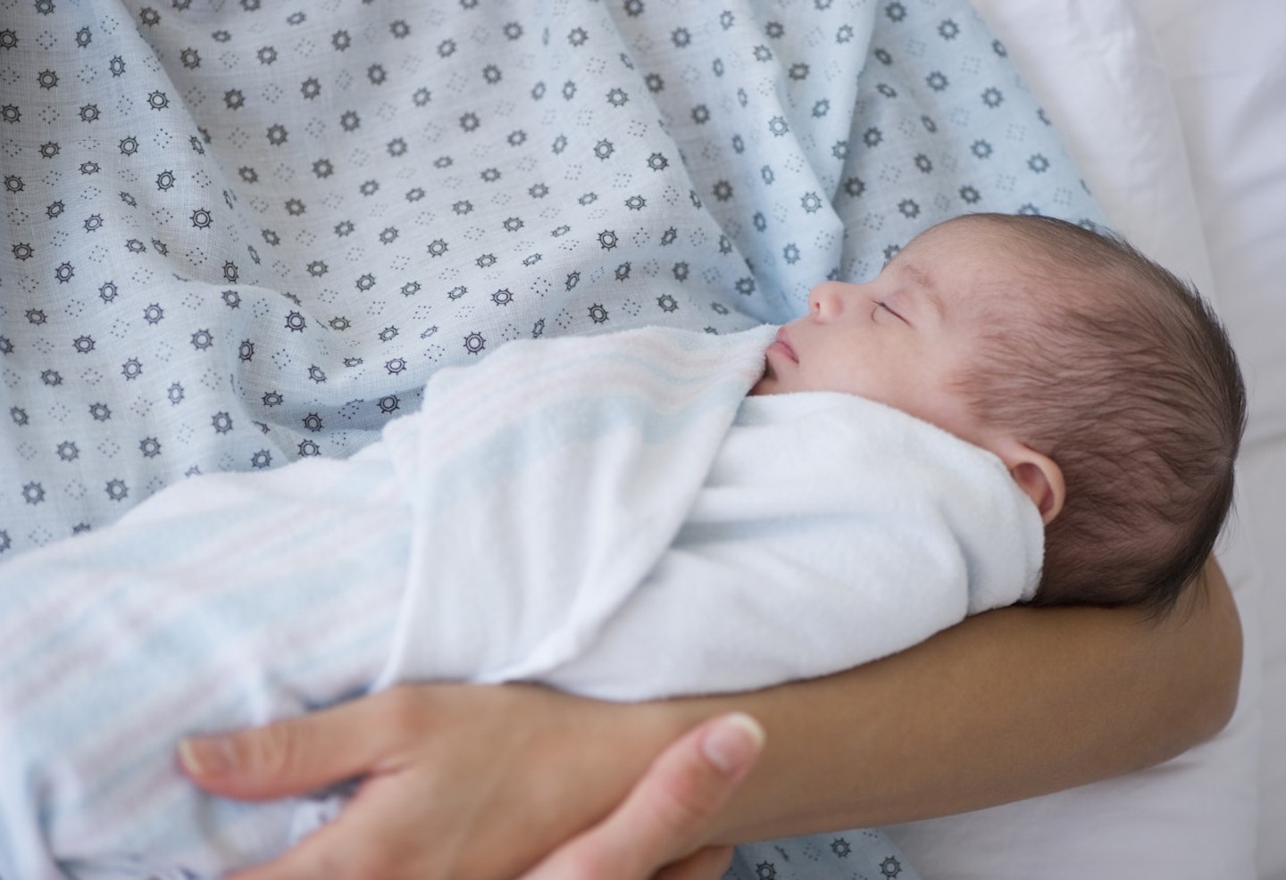 Swaddling your newborn could help him to sleep