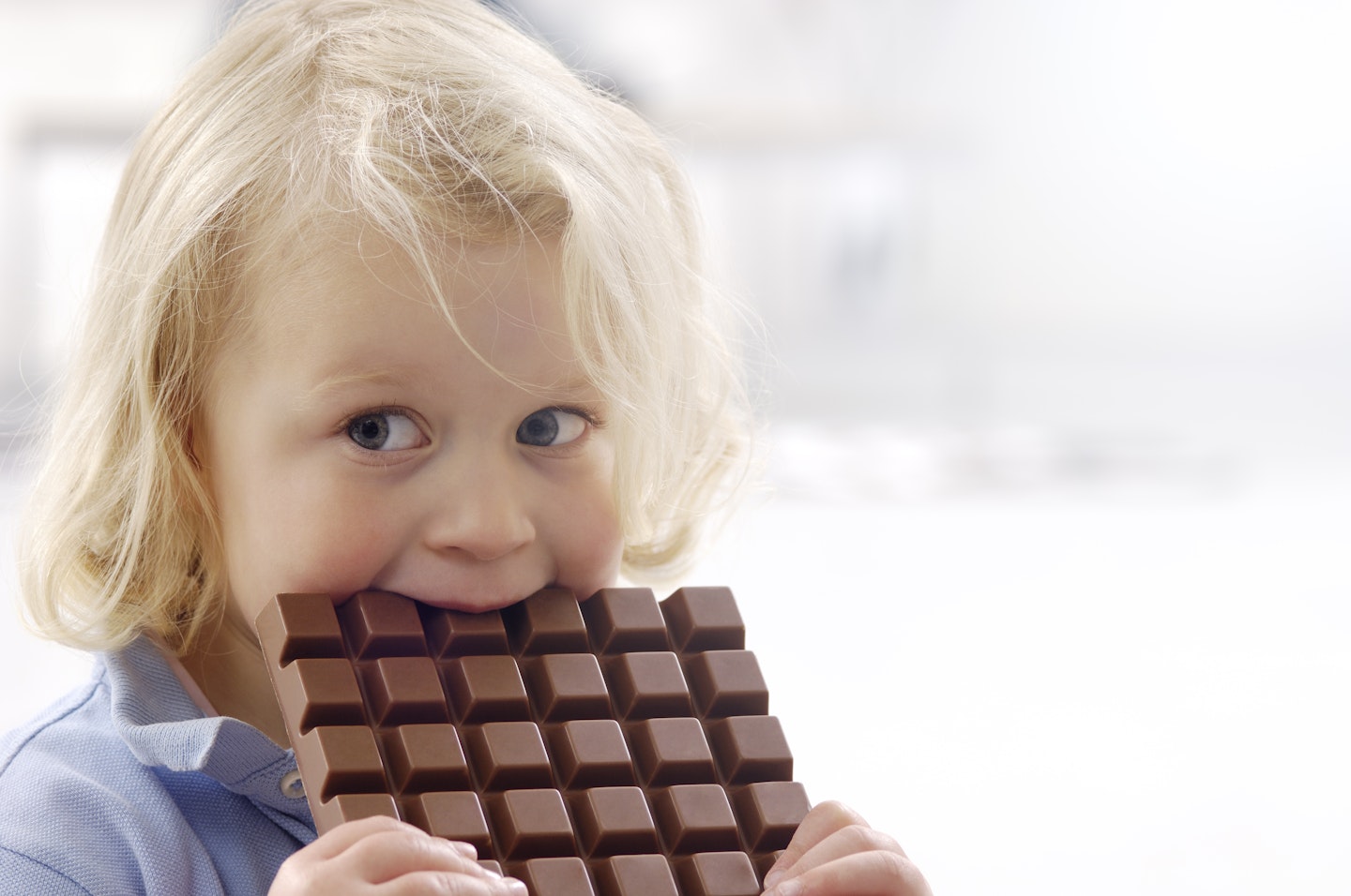 Toddler eating chocolate 