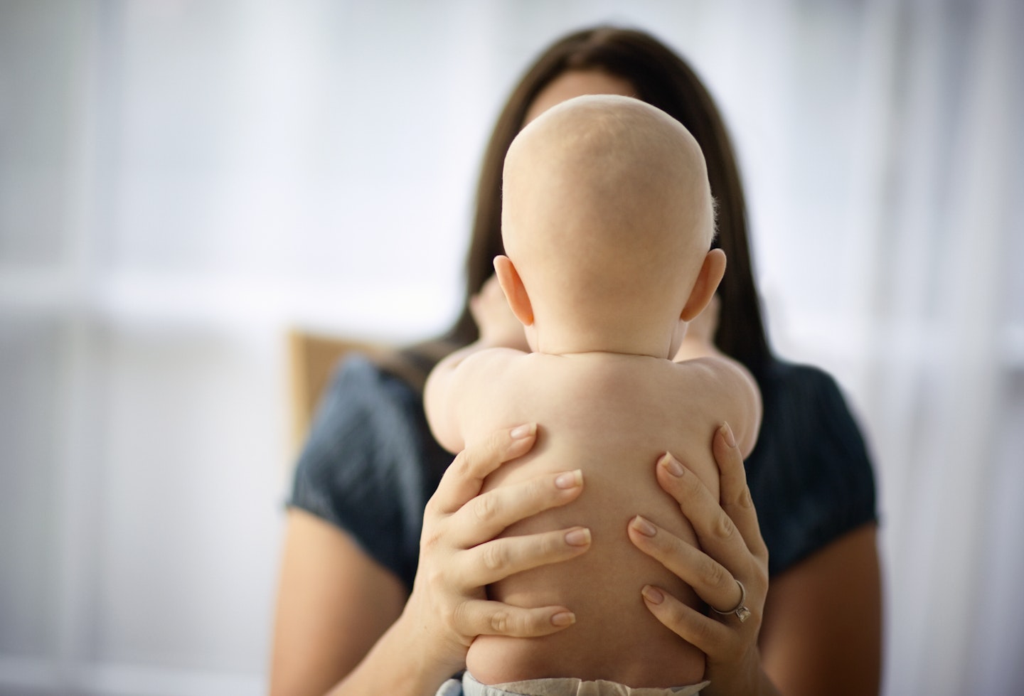 Mum holding baby