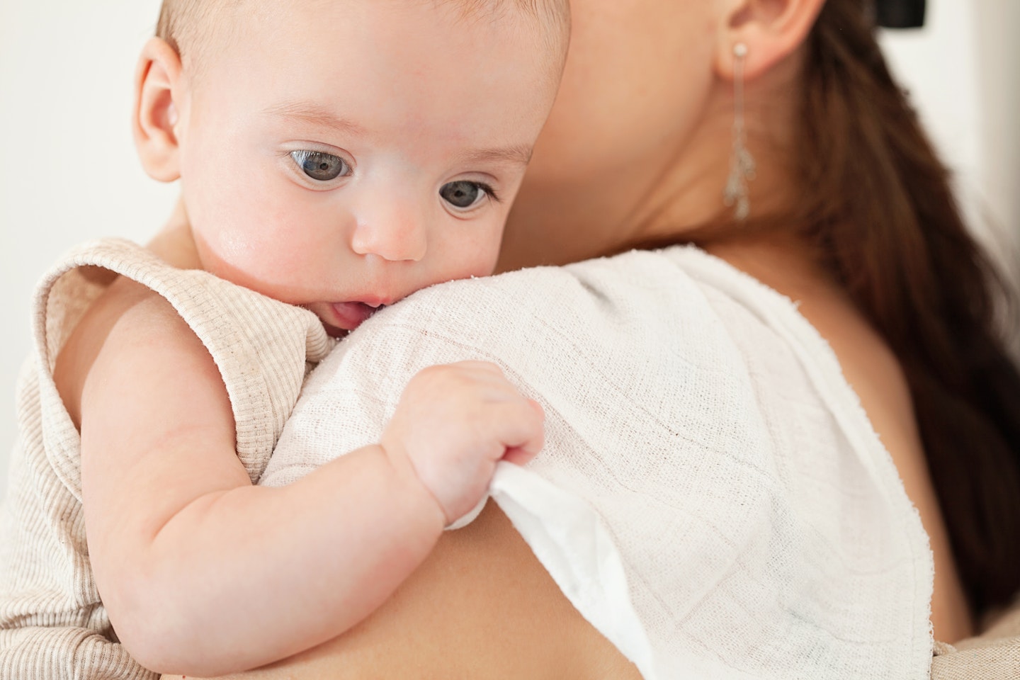 mum holding baby