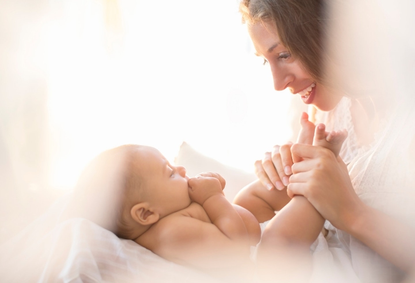 mum and baby playing