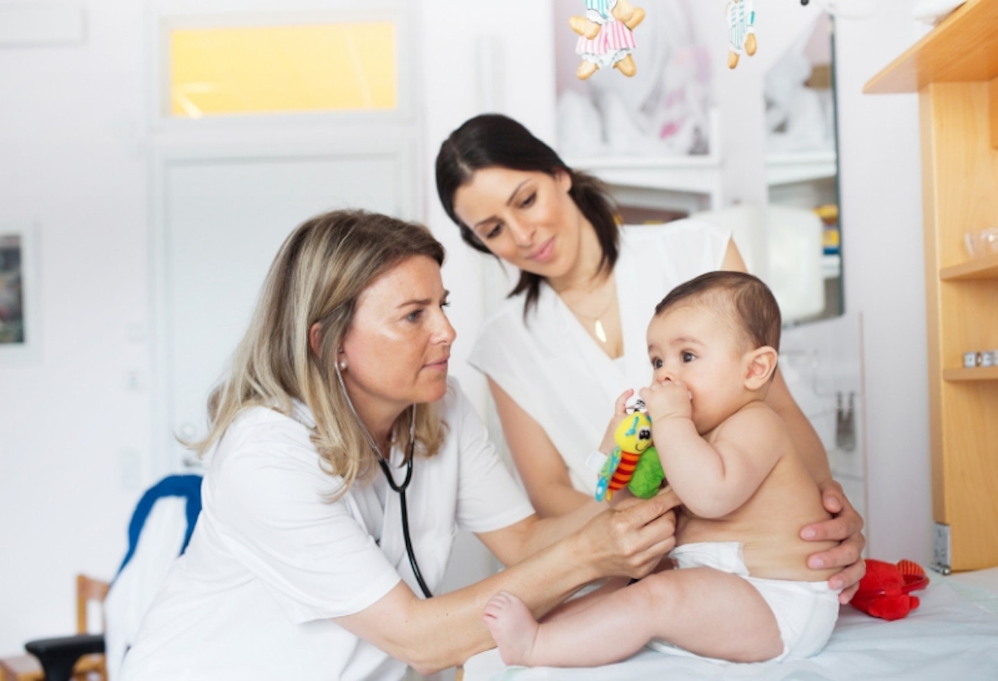Midwife with baby