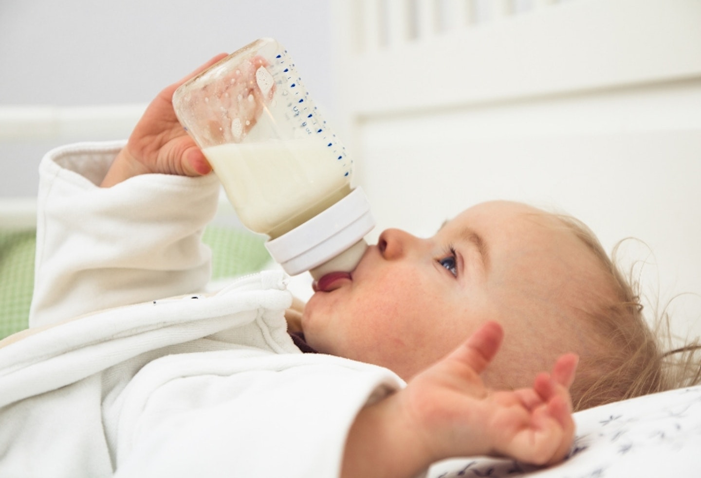 Baby drinking with bottle