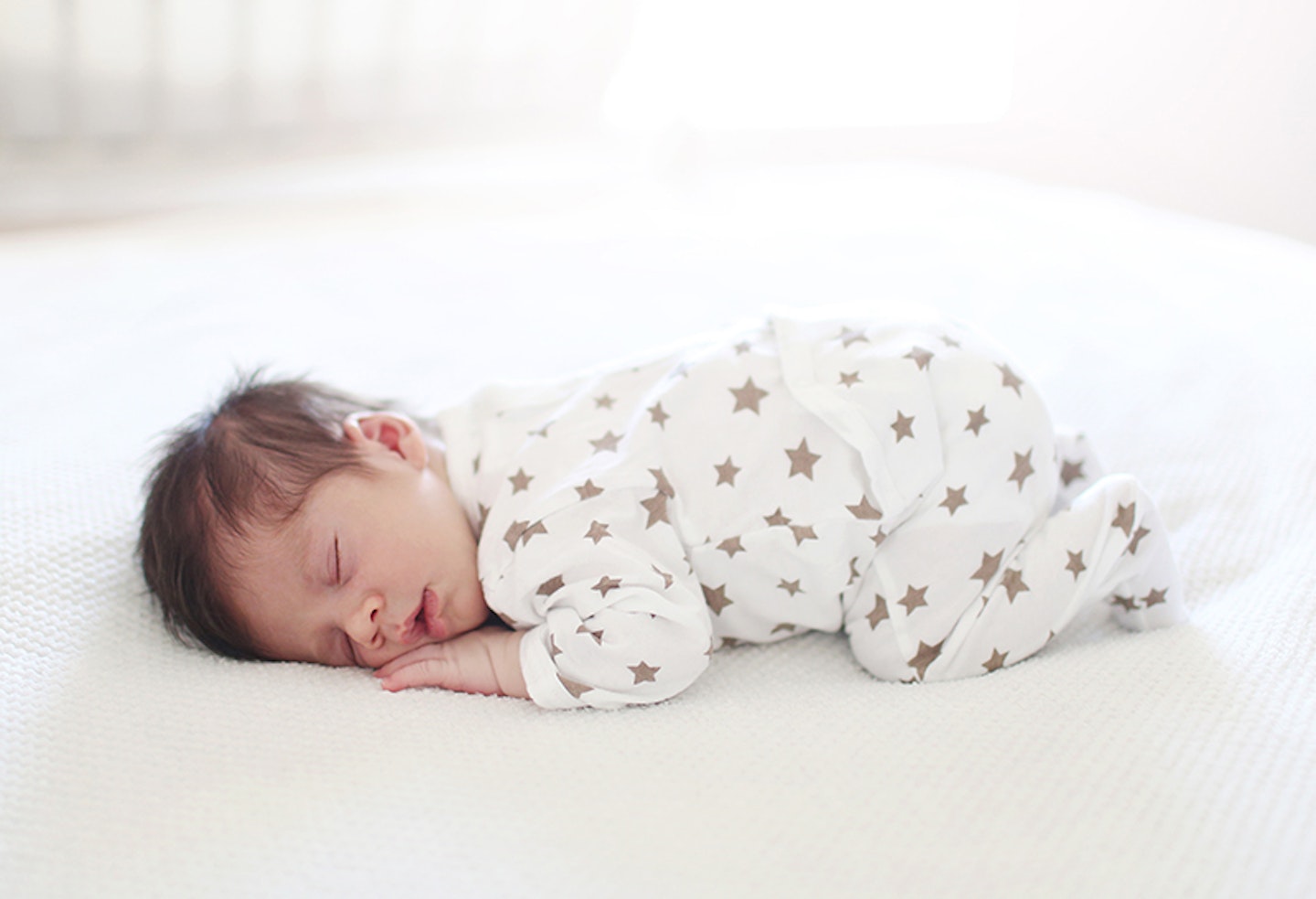 Baby sleeping on their front? Here’s what to do