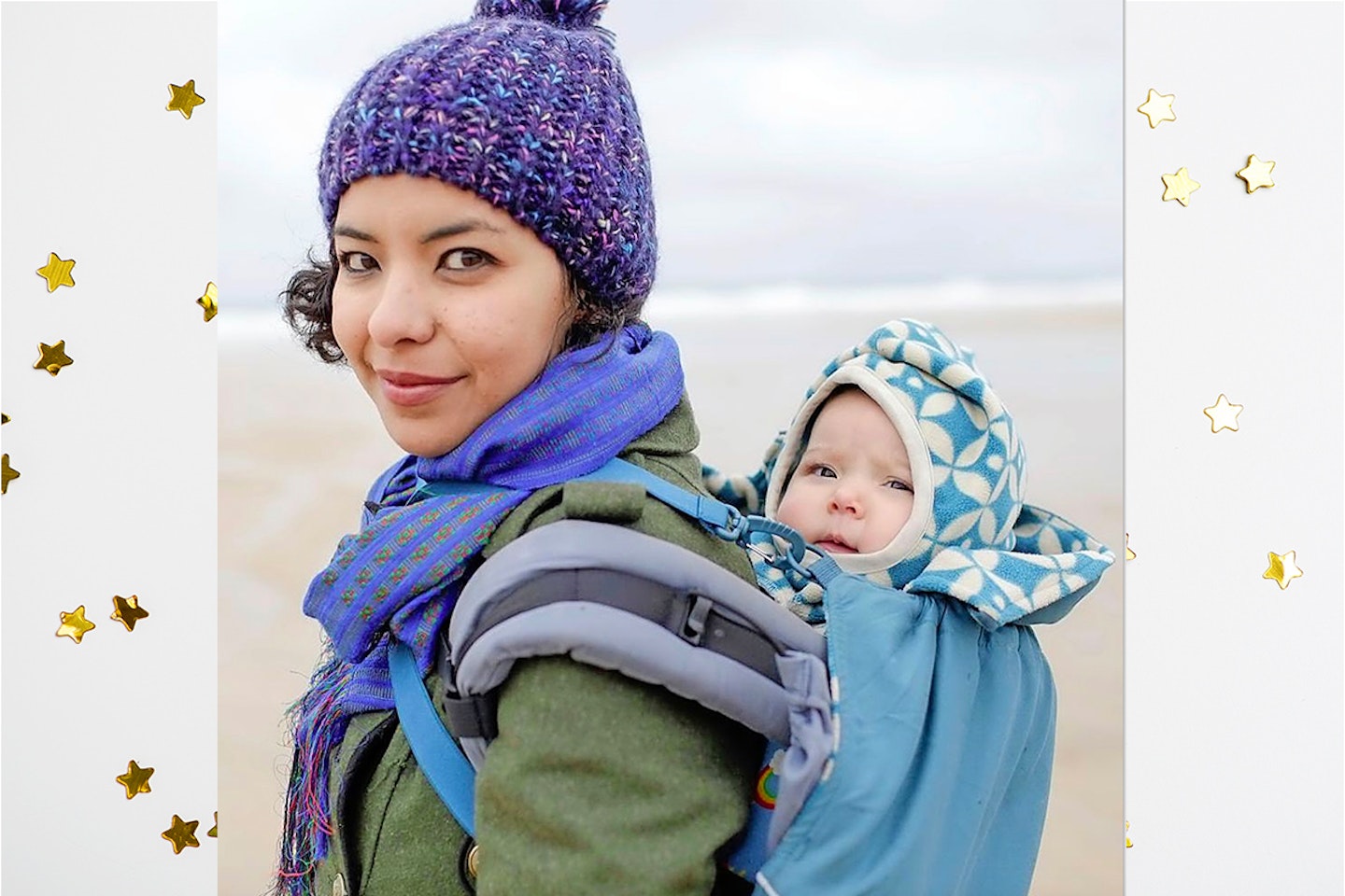 Mother carrying baby