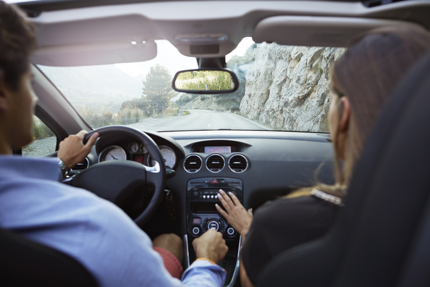 Parents driving in the car together