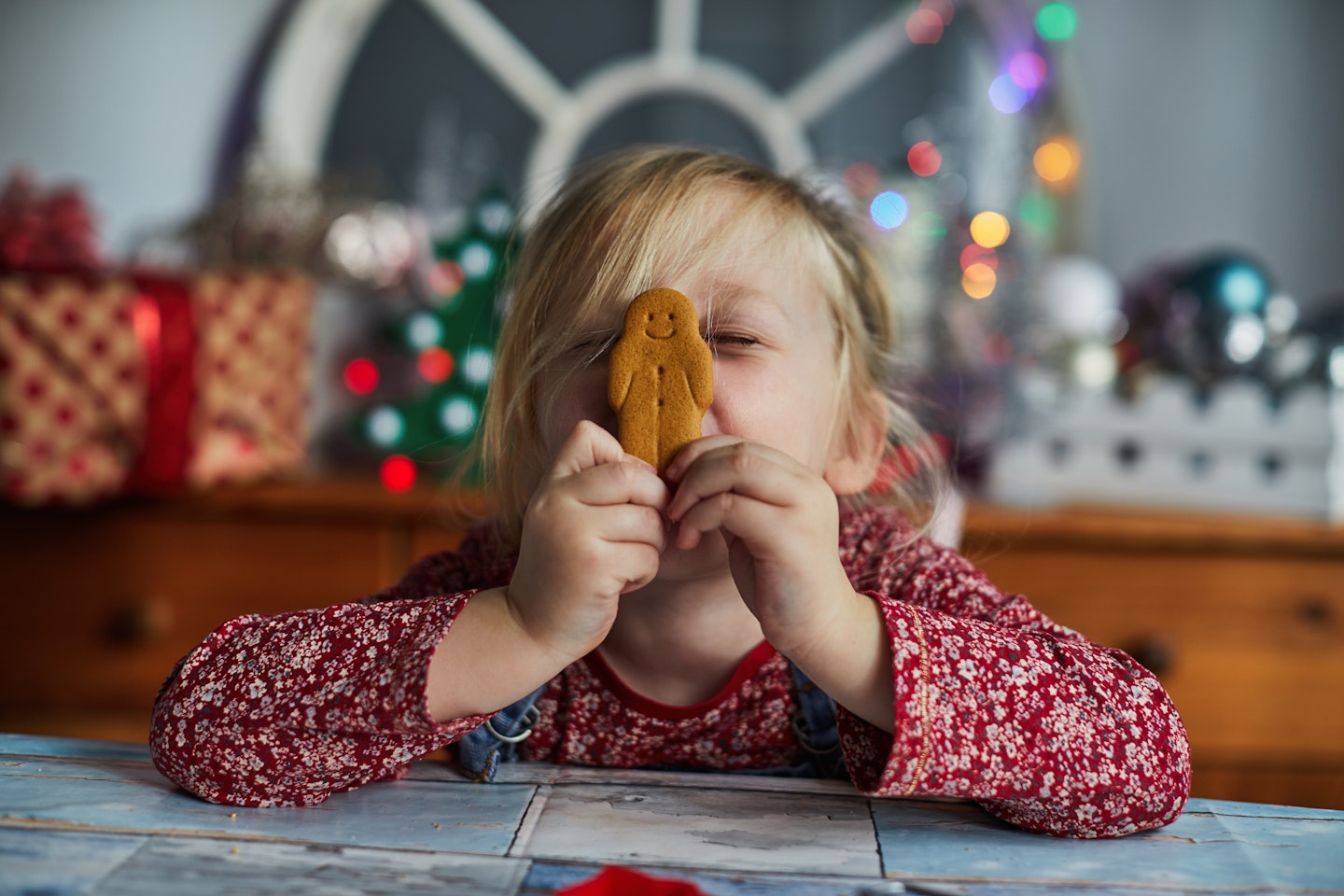 Girl holding a gingerbread man
