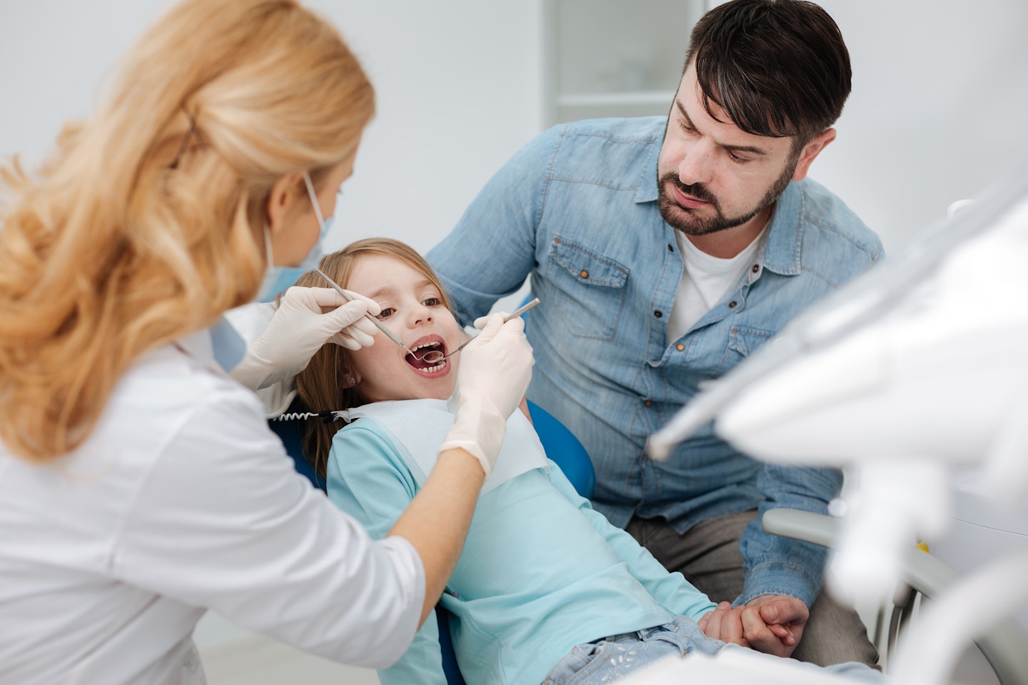 dad and daughter at dentist