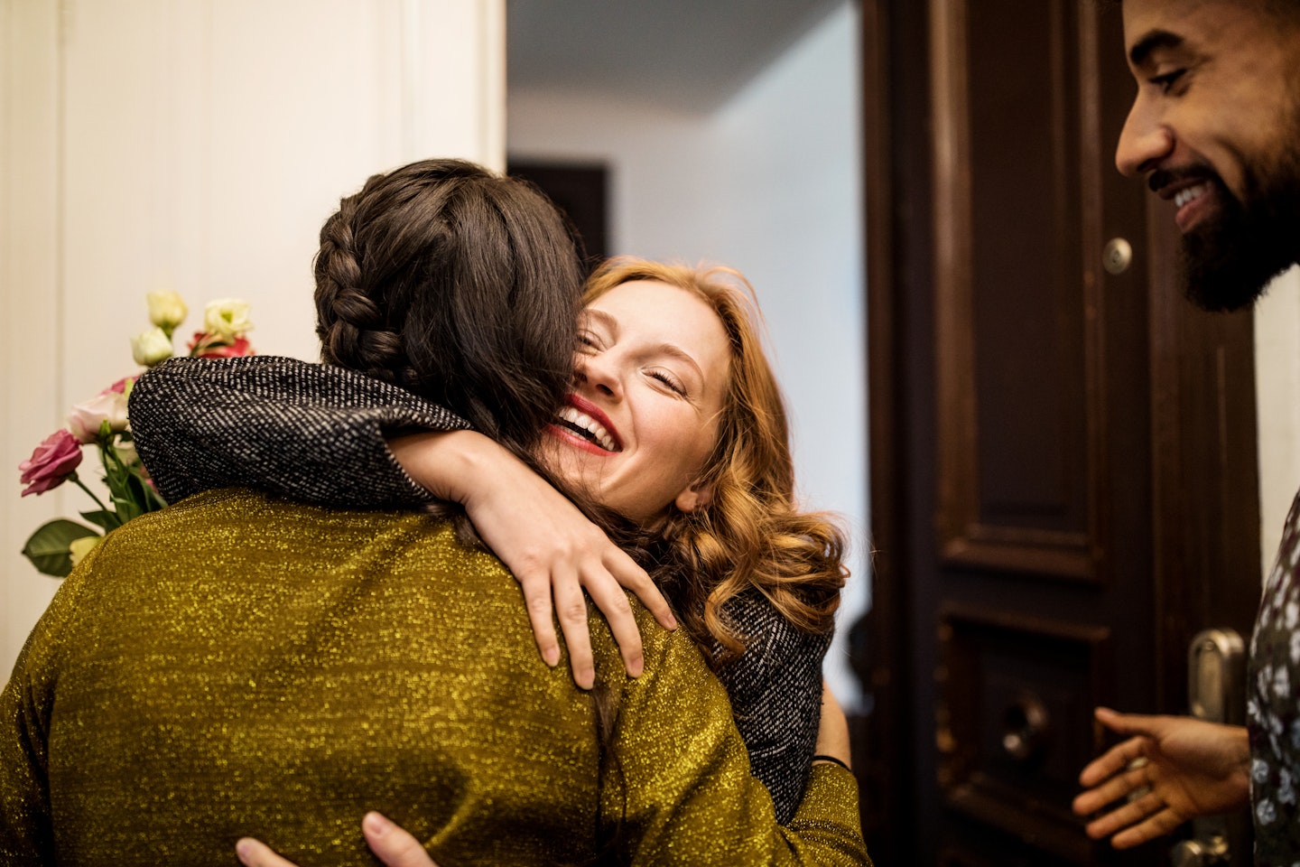 2 women hugging 