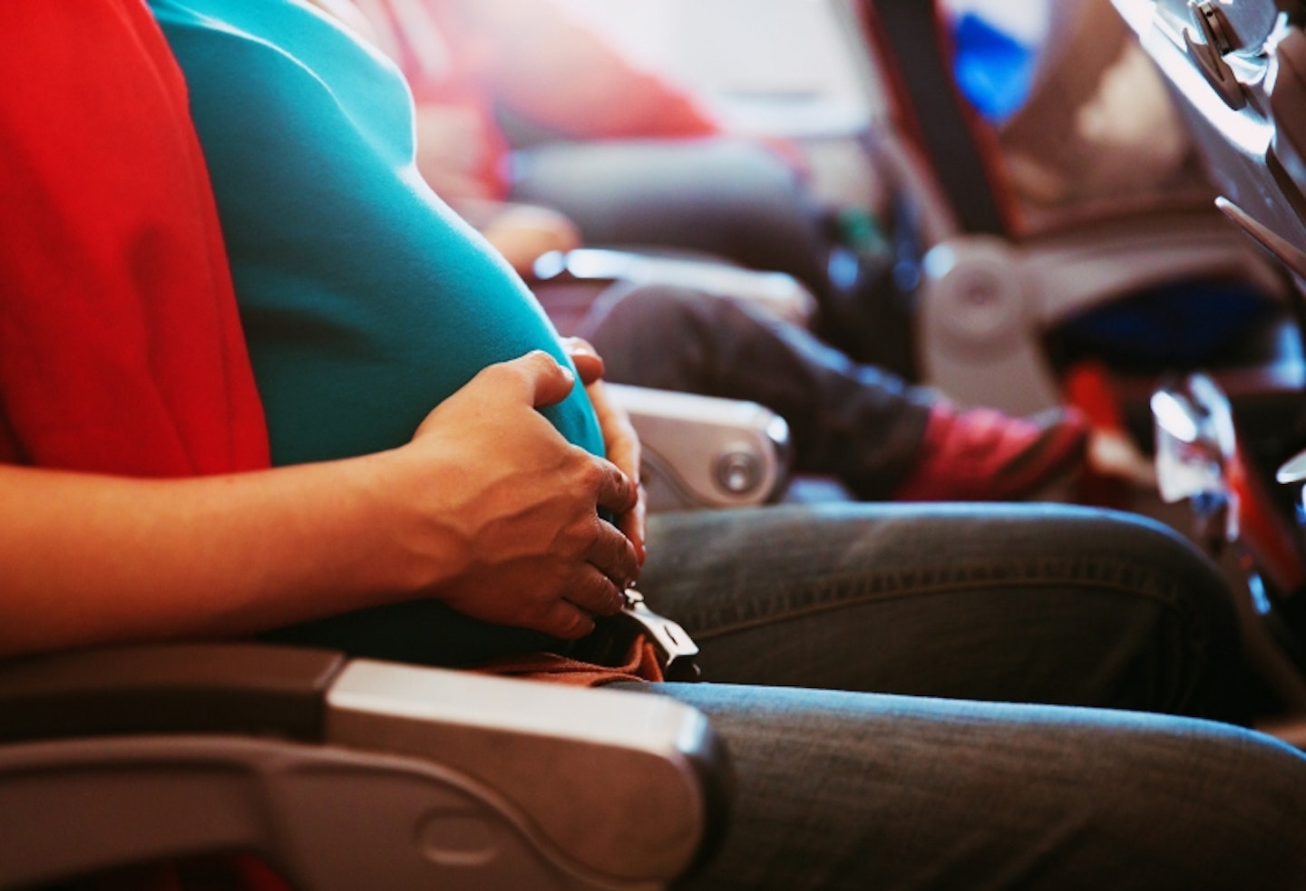 Pregnant woman on an aeroplane