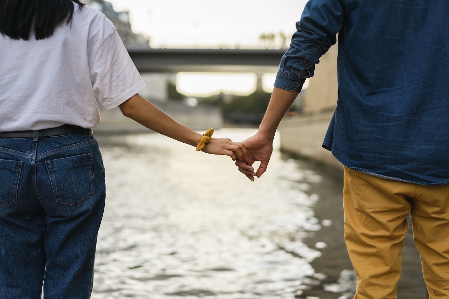 Man and women holding hands