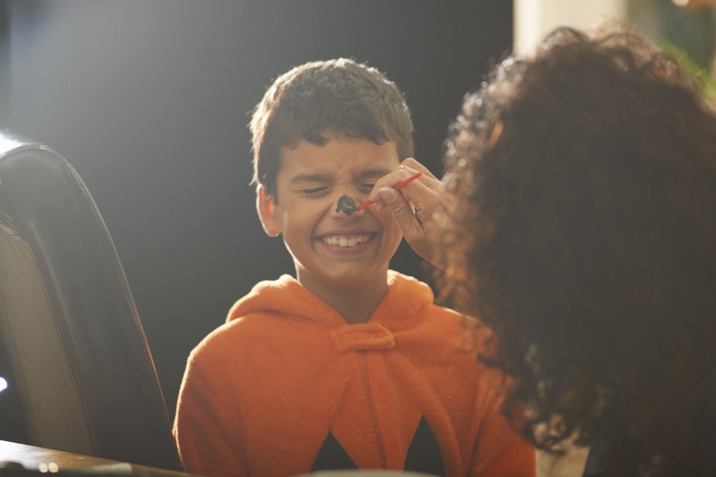 child getting face painted