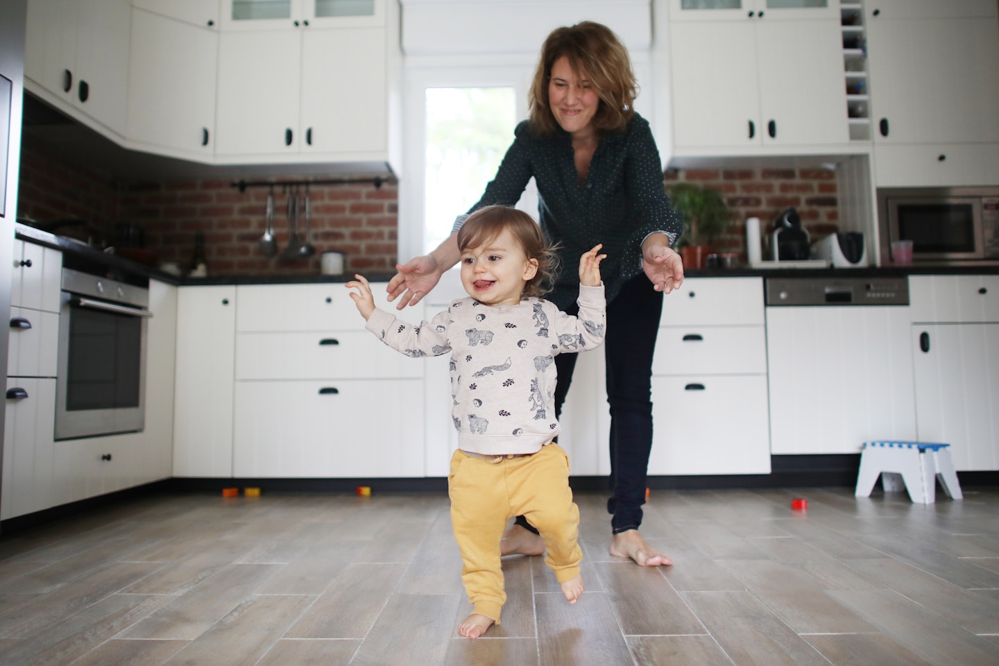 mum playing with toddler