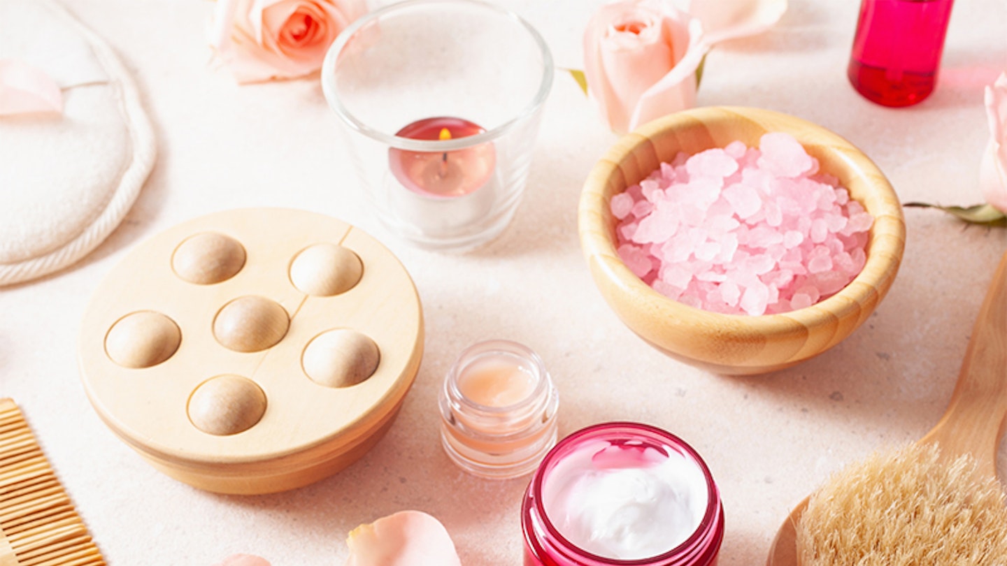 Natural organic skincare products with rose petals