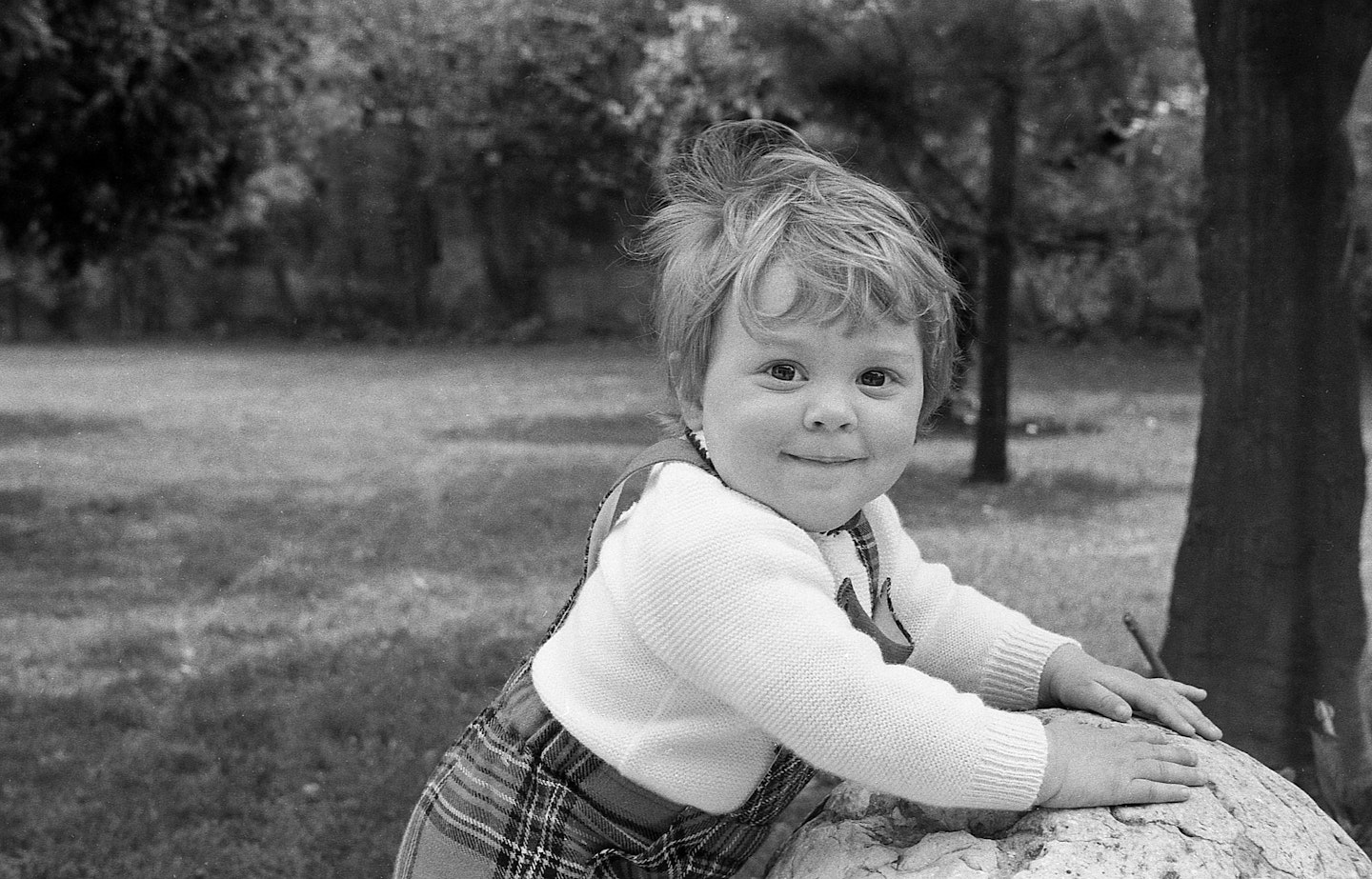 black and white image of toddler