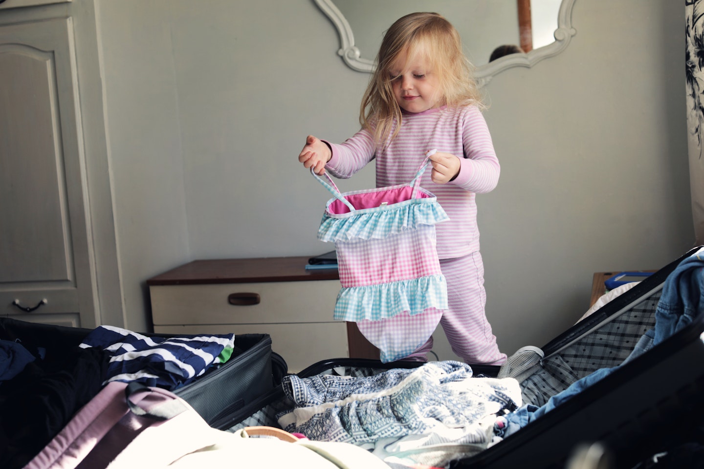 girl packing for holiday