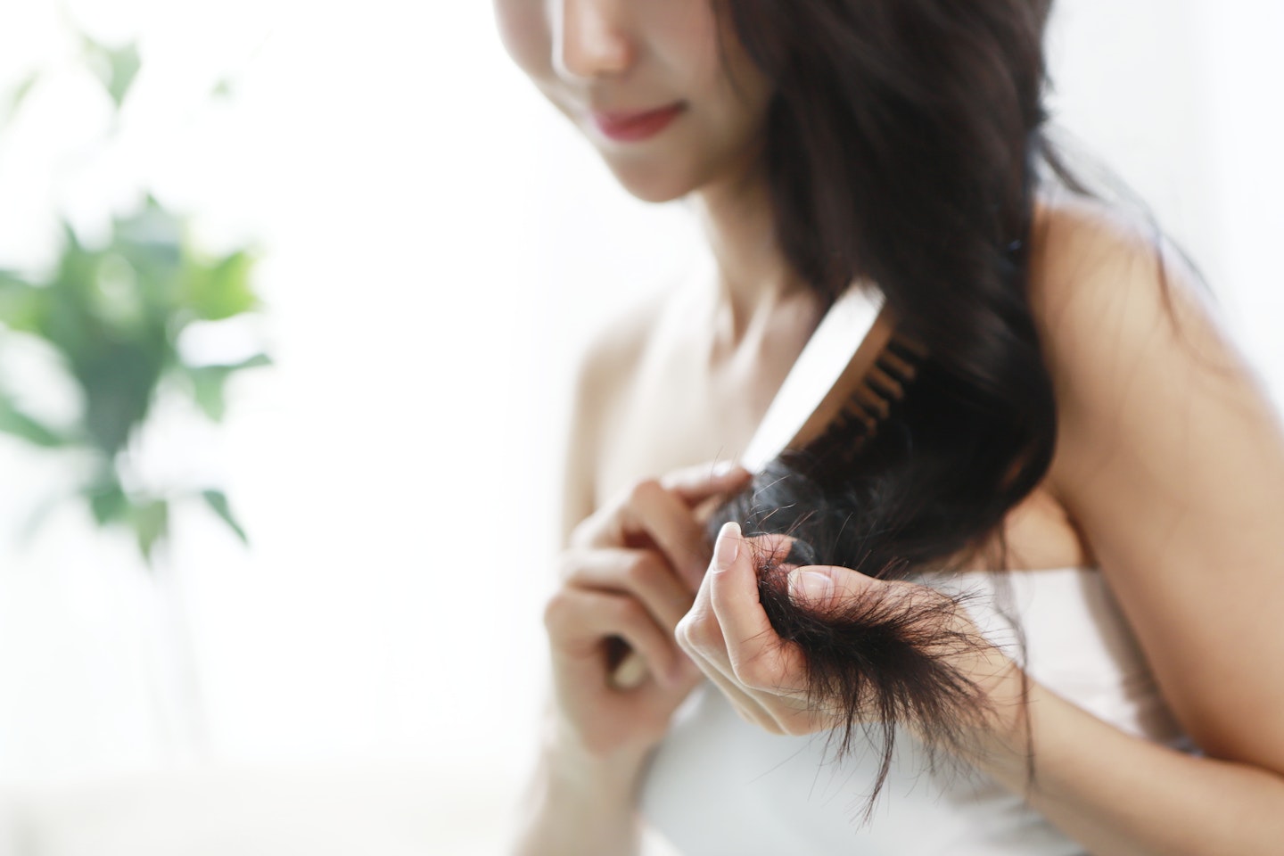 Woman brushing hair