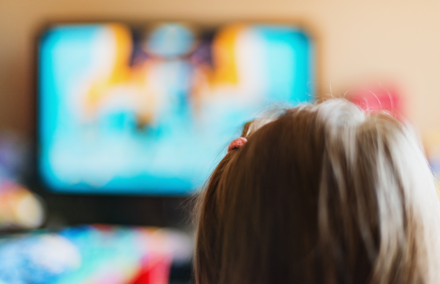 Toddler watching a film