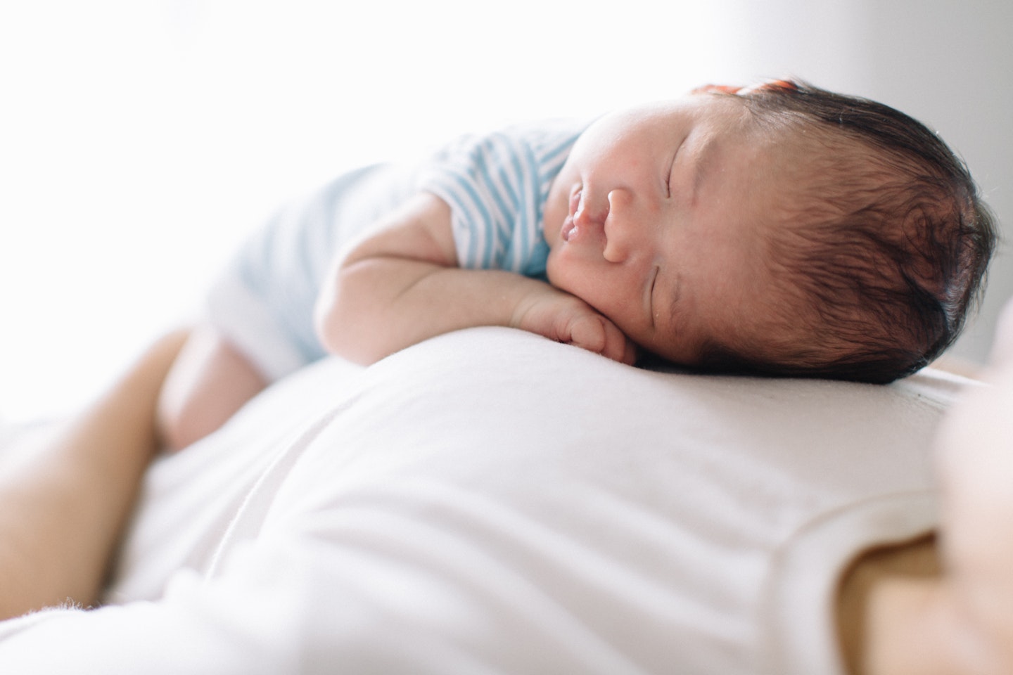 baby resting on mum's chest