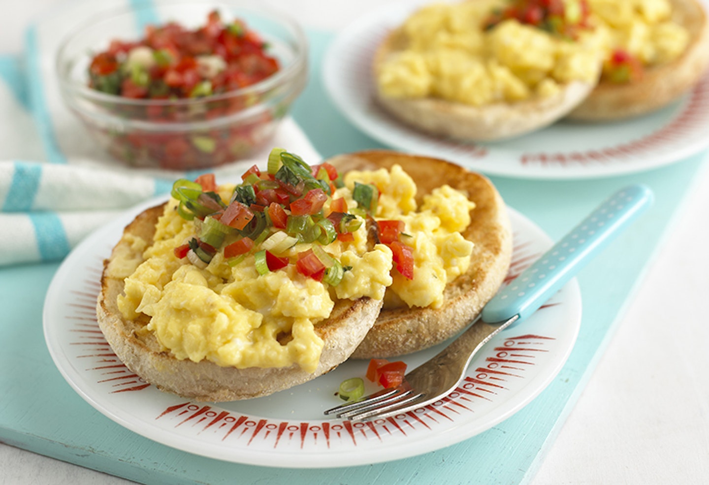 Scrambled egg with tomato and salsa on an English muffin by Annabel Karmel