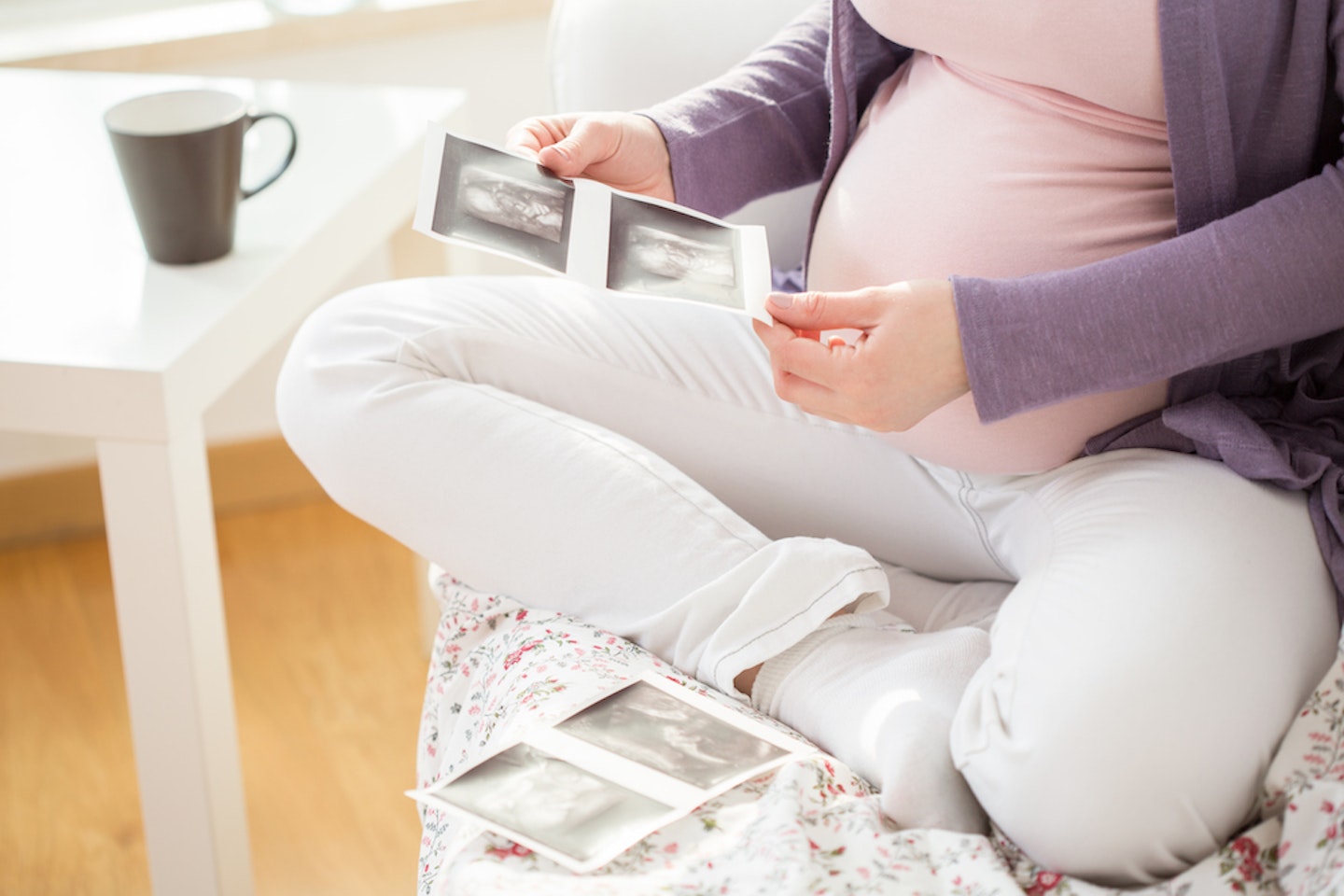 woman holding baby scan