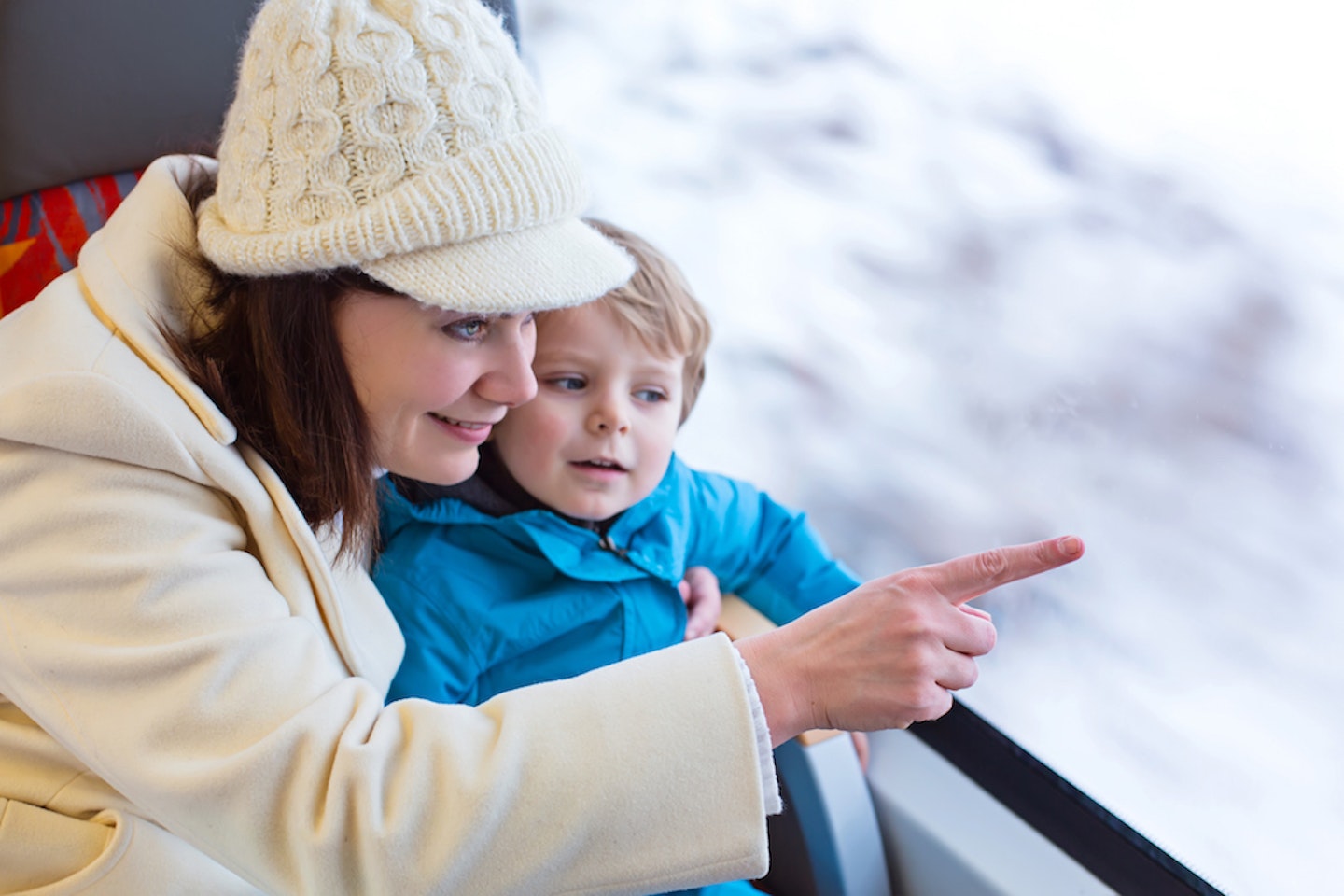 mum and toddler on train