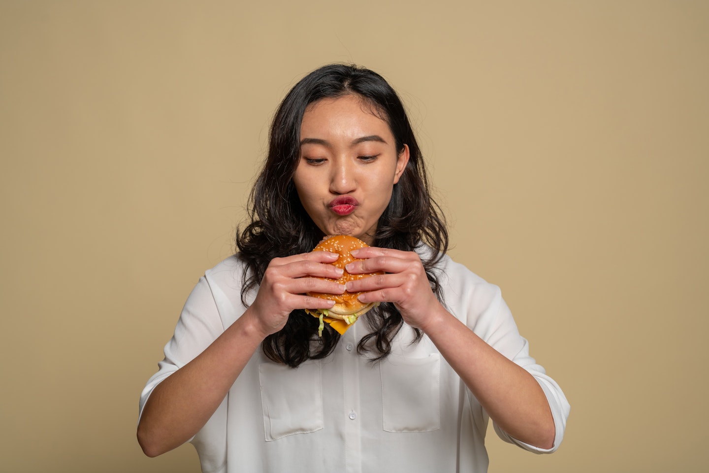 Woman eating a burger