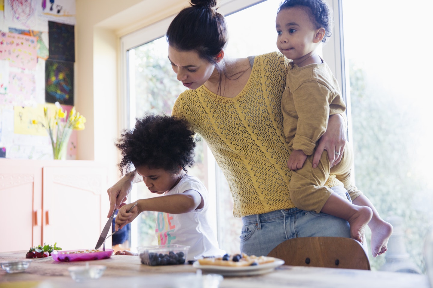 Mum cooking with her kids