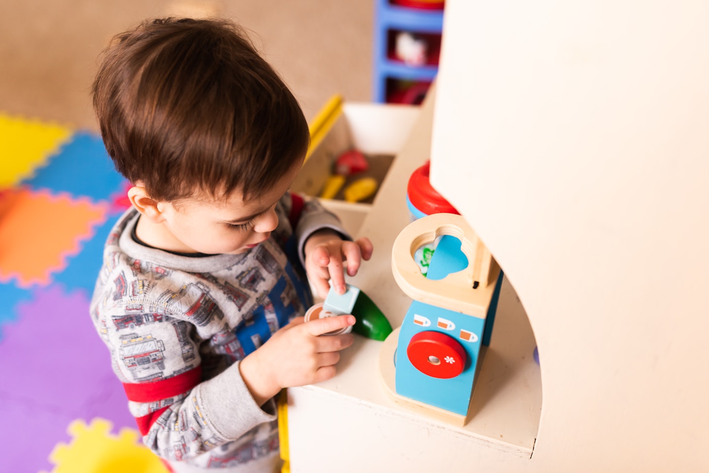 Toddler playing with blocks