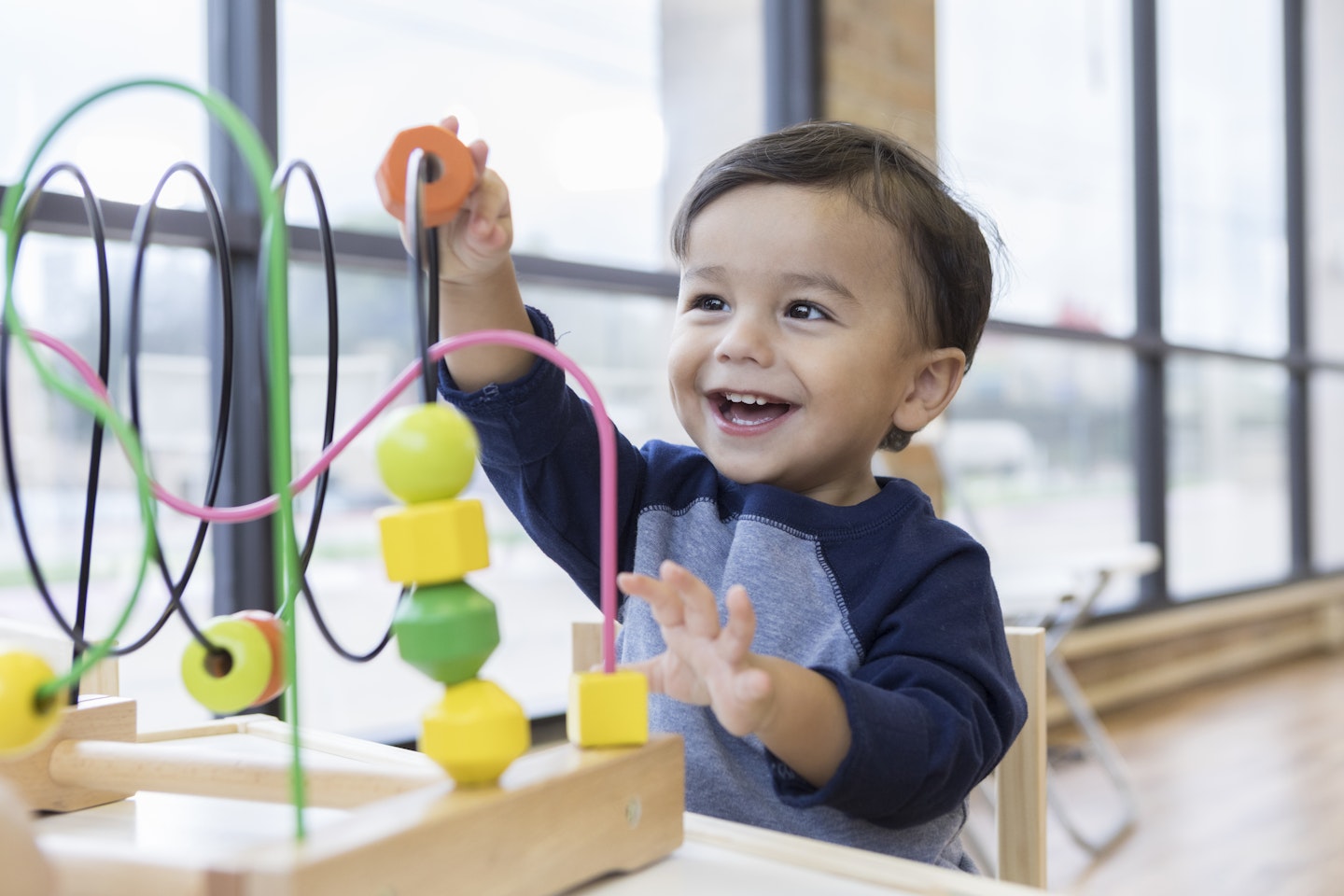 Toddler playing at nursery