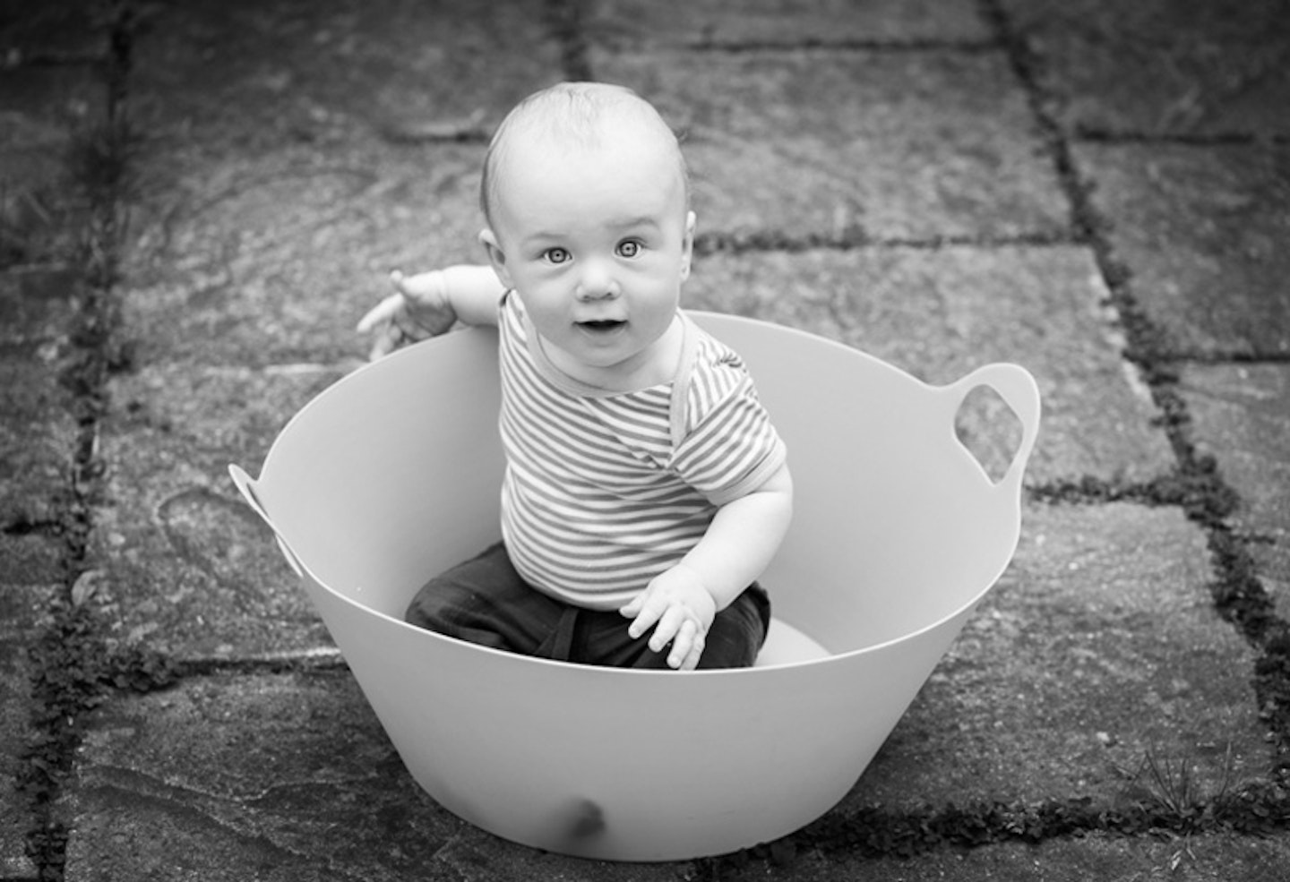 baby in wash basket