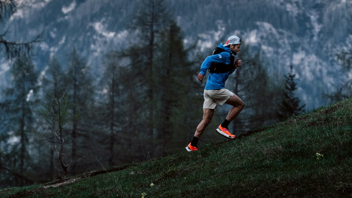 The north face summit vectiv pro shoe running up hill